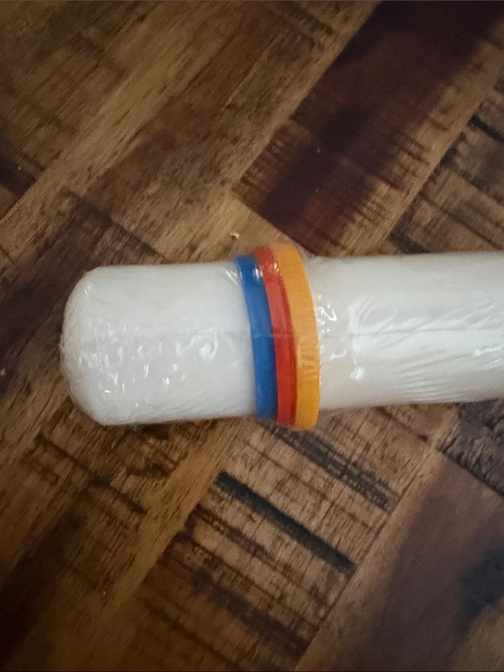 Wilton White Fondant Roller with Orange, Red and Blue Bands